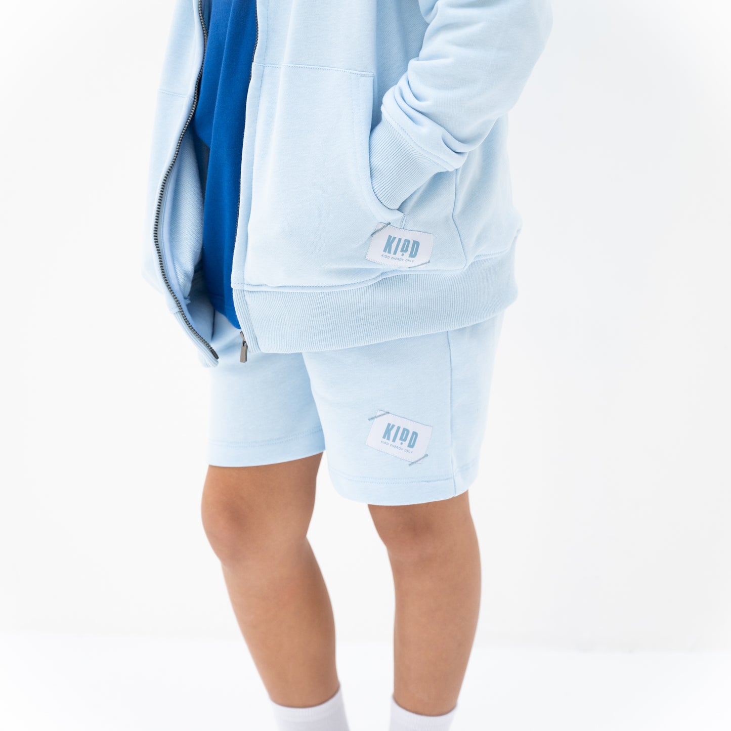 KIDD, @kidd.ae e-shop conceptual children’s brand genderless clothing I AM hoodie color sky blue Dubai