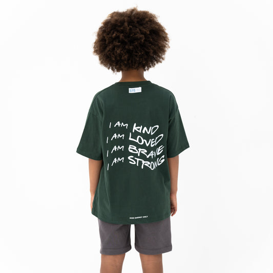 KIDD, @kidd.ae e-shop conceptual children’s brand genderless clothing I AM t-shirt color bottle green Dubai