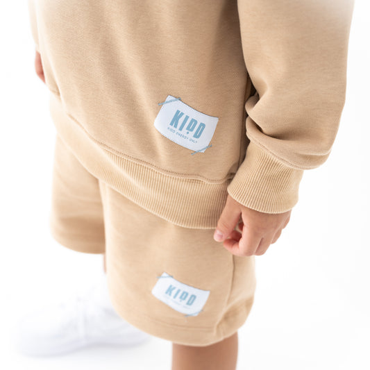 KIDD, @kidd.ae e-shop conceptual children’s brand genderless clothing 11:11 sweatshirt color sand / beige Dubai