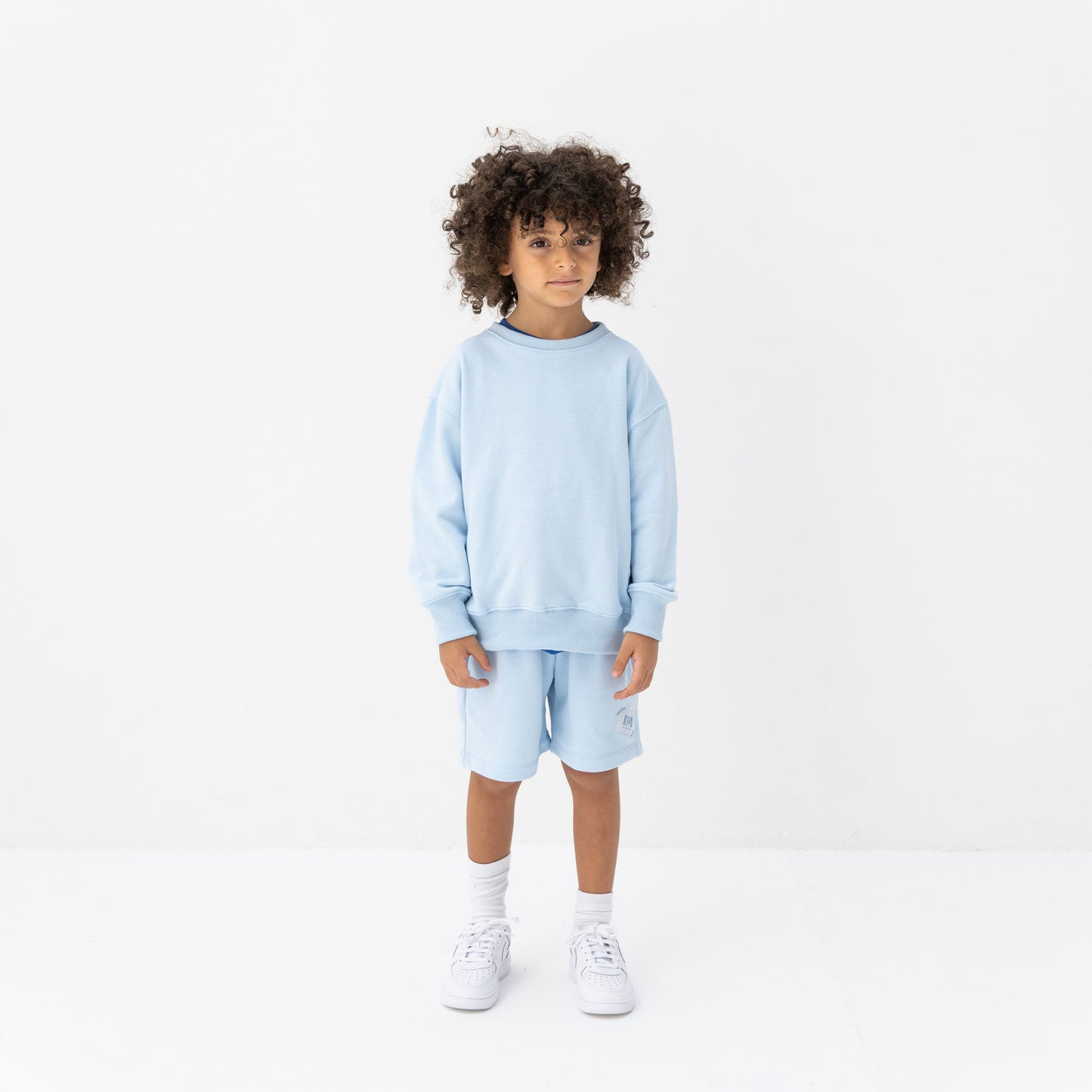 KIDD, @kidd.ae e-shop conceptual children’s brand genderless clothing I AM sweatshirt color sky blue Dubai
