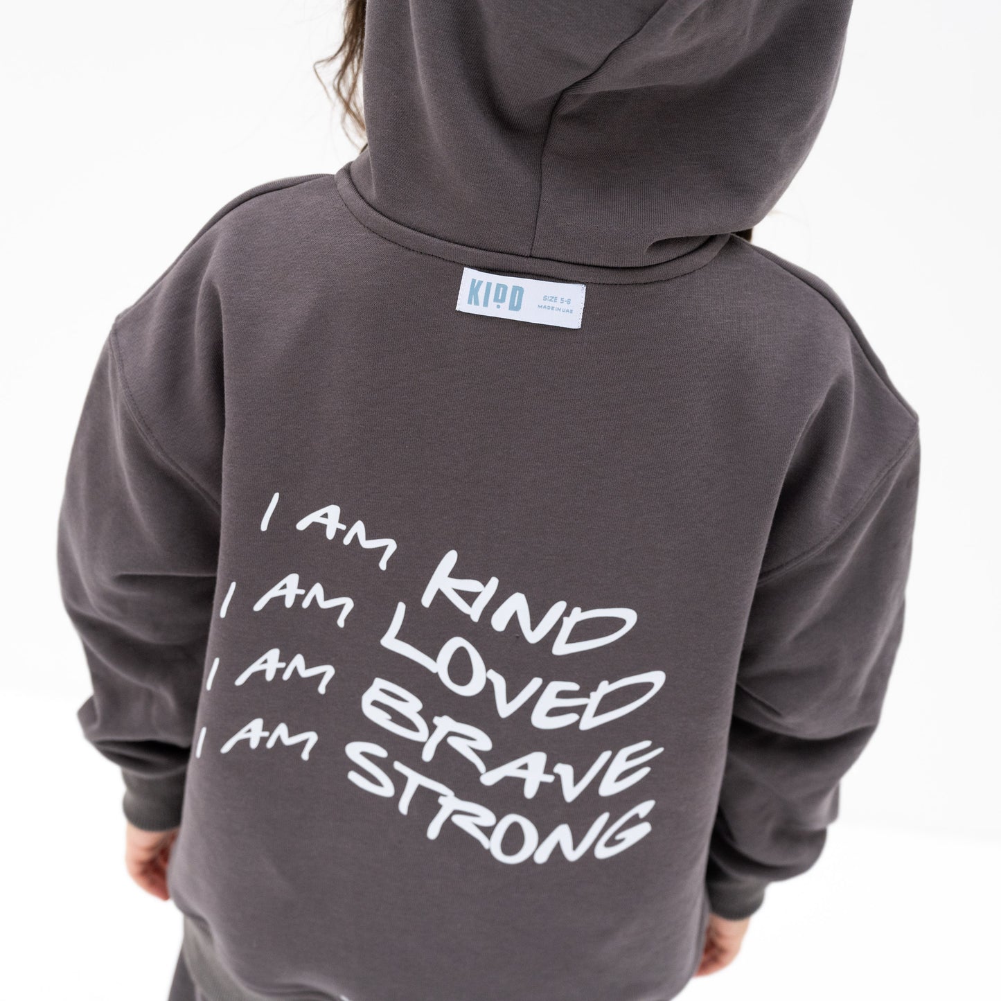 KIDD, @kidd.ae e-shop conceptual children’s brand genderless clothing I AM hoodie color medium grey Dubai