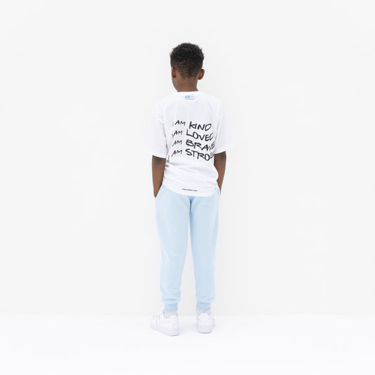 KIDD, @kidd.ae e-shop conceptual children’s brand genderless clothing jogger color sky blue Dubai