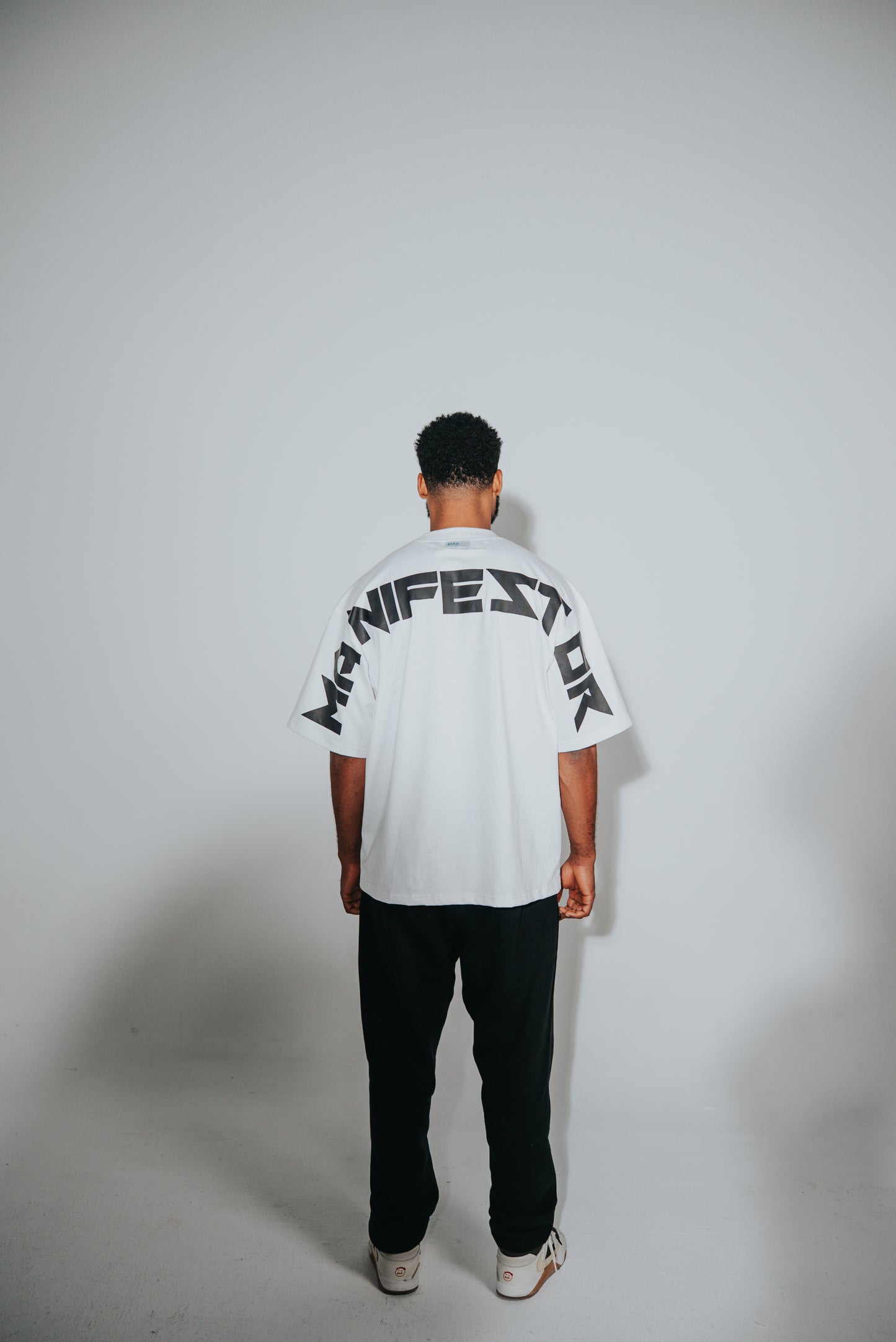 KIDD, @kidd.ae e-shop conceptual brand genderless clothing Manifestor t-shirt oversized fit premium color white Dubai