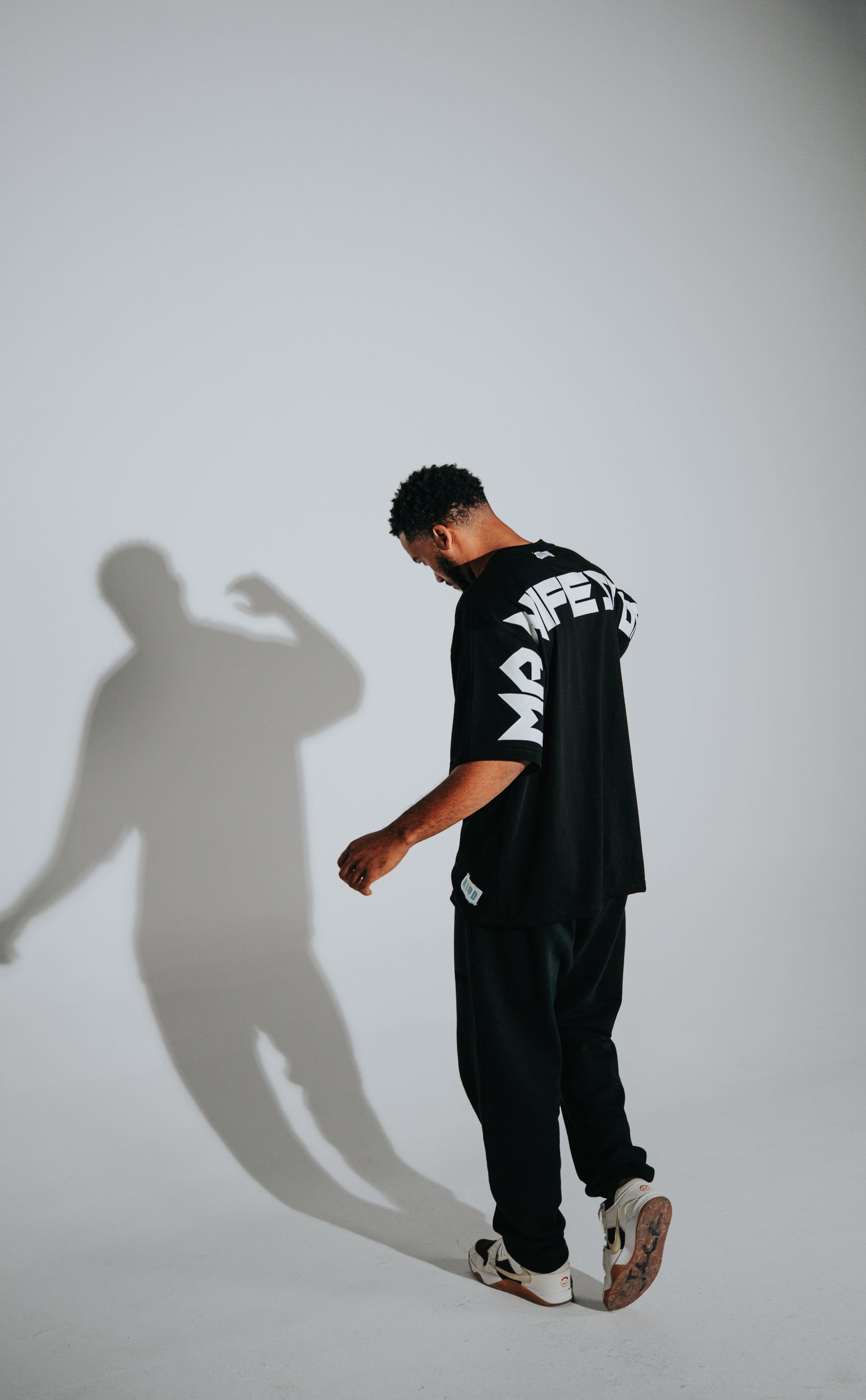 KIDD, @kidd.ae e-shop conceptual brand genderless clothing Manifestor t-shirt oversized fit premium color black Dubai