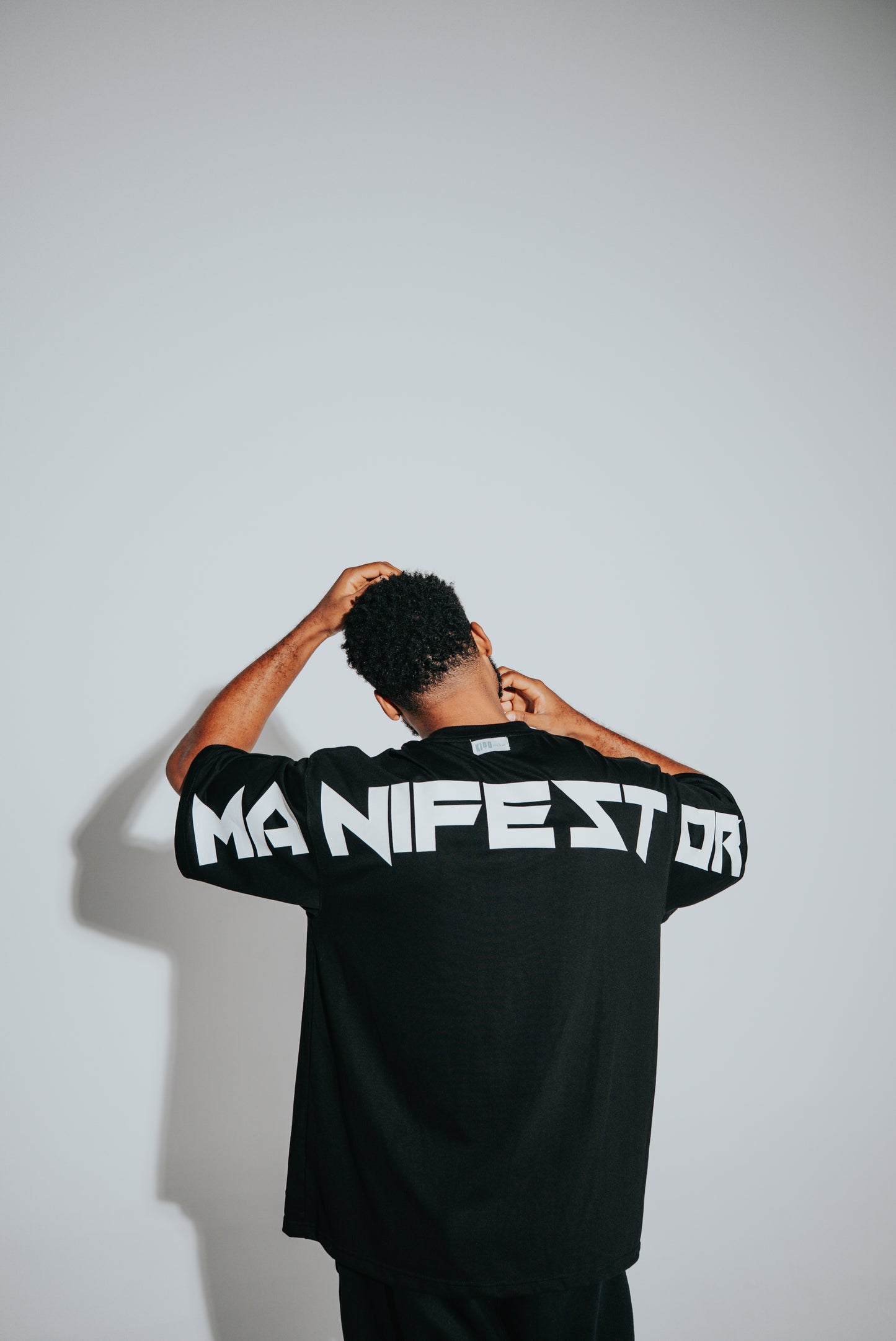 KIDD, @kidd.ae e-shop conceptual brand genderless clothing Manifestor t-shirt oversized fit premium color black Dubai