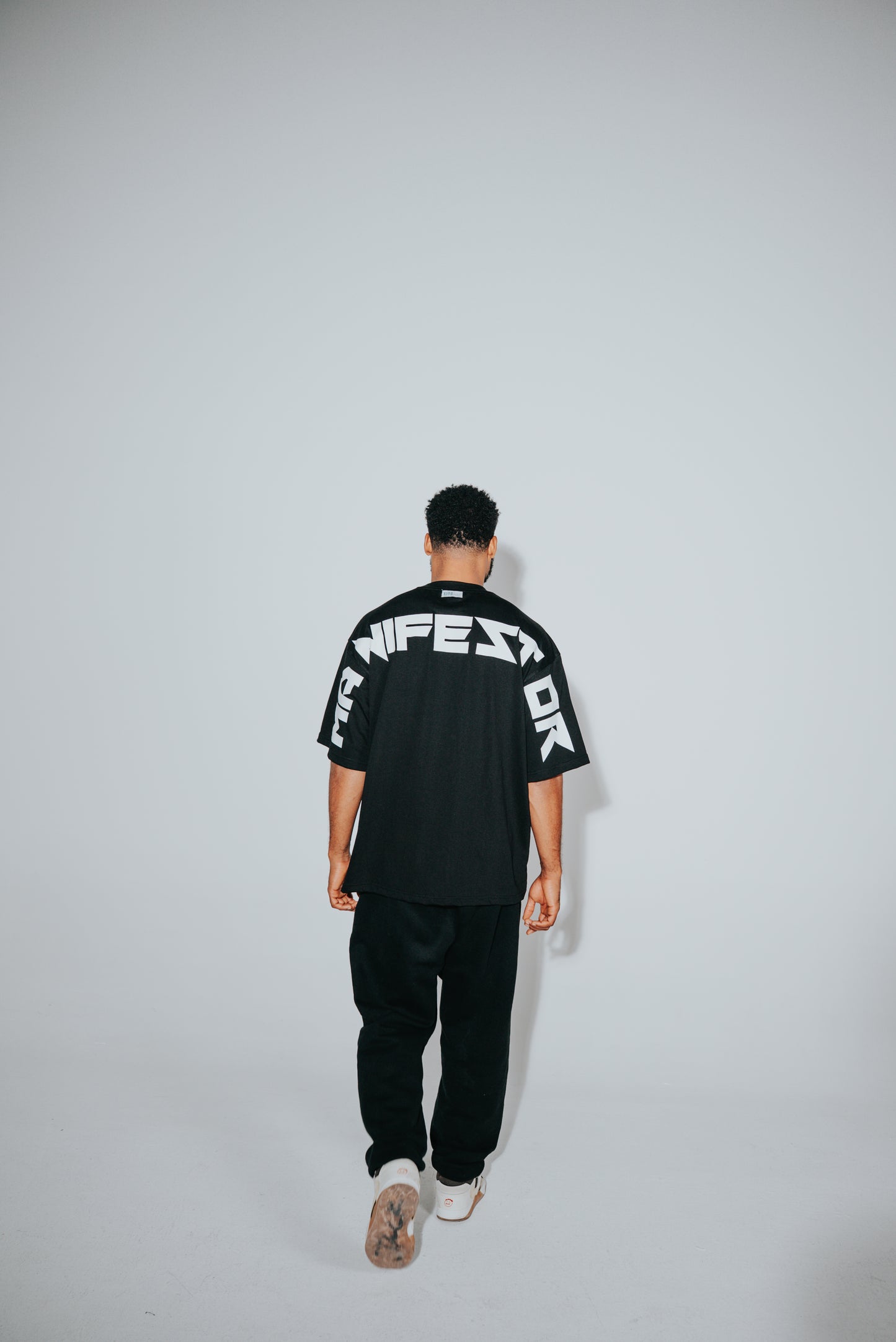 KIDD, @kidd.ae e-shop conceptual brand genderless clothing Manifestor t-shirt oversized fit premium color black Dubai