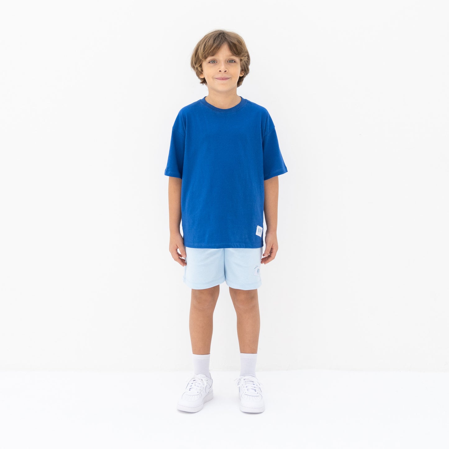 KIDD, @kidd.ae e-shop conceptual children’s brand genderless clothing I AM t-shirt color cobalt blue Dubai