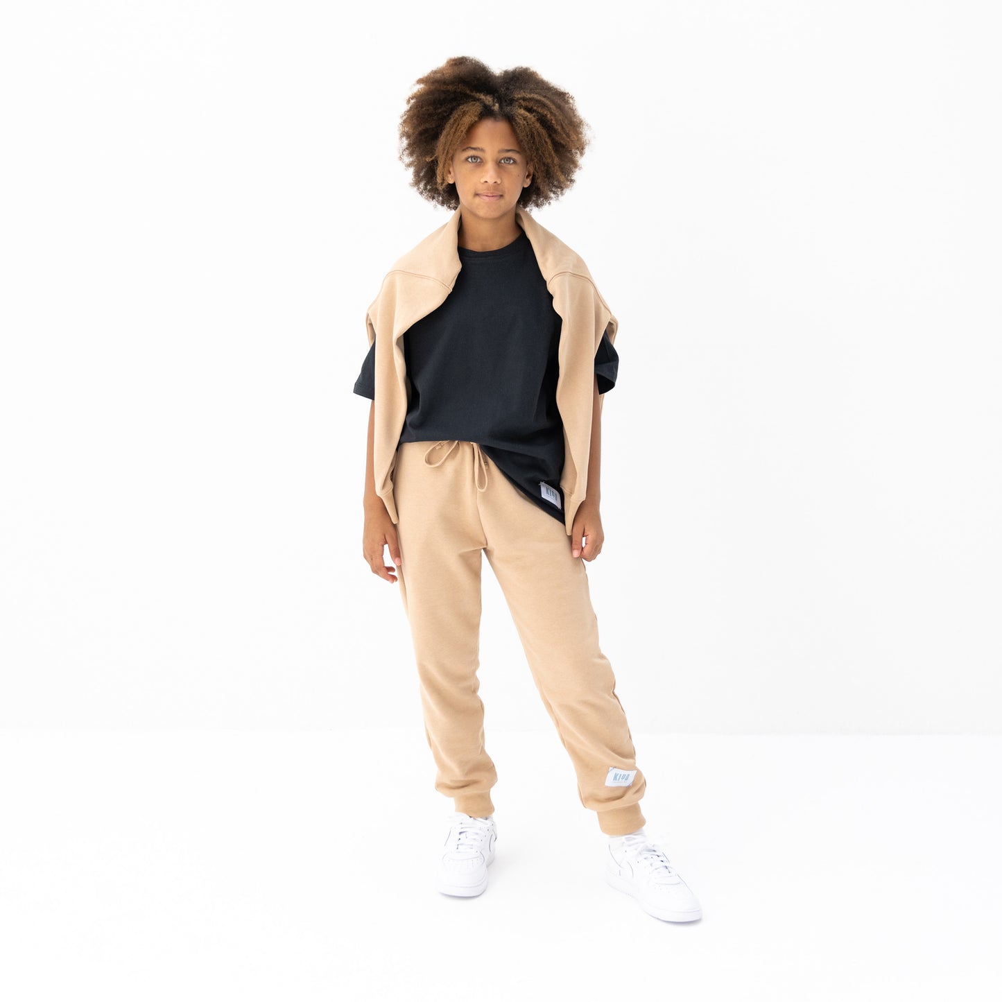 KIDD, @kidd.ae e-shop conceptual children’s brand genderless clothing jogger color sand / beige Dubai