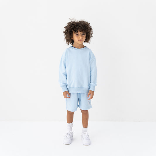 KIDD, @kidd.ae e-shop conceptual children’s brand genderless clothing I AM sweatshirt color sky blue Dubai