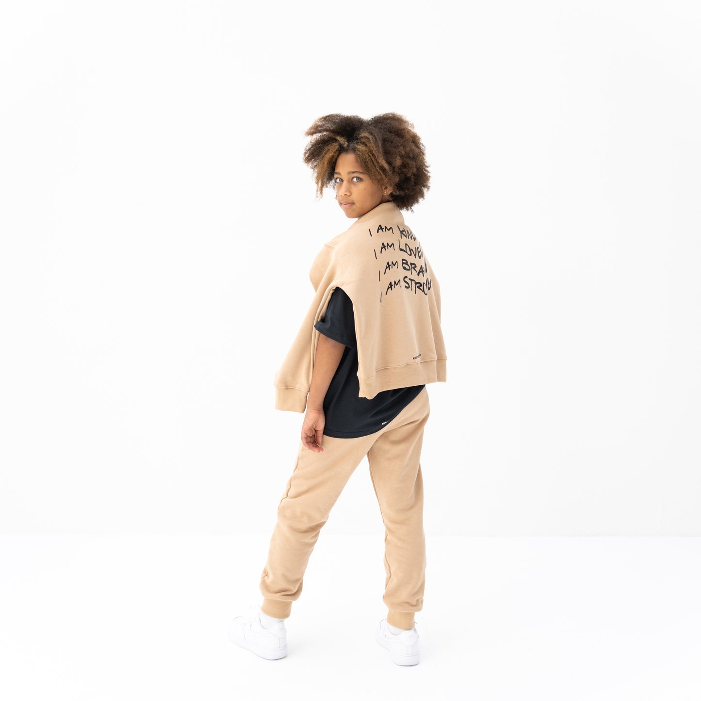 KIDD, @kidd.ae e-shop conceptual children’s brand genderless clothing jogger color sand / beige Dubai