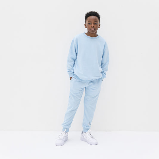 KIDD, @kidd.ae e-shop conceptual children’s brand genderless clothing 11:11 sweatshirt color sky blue Dubai