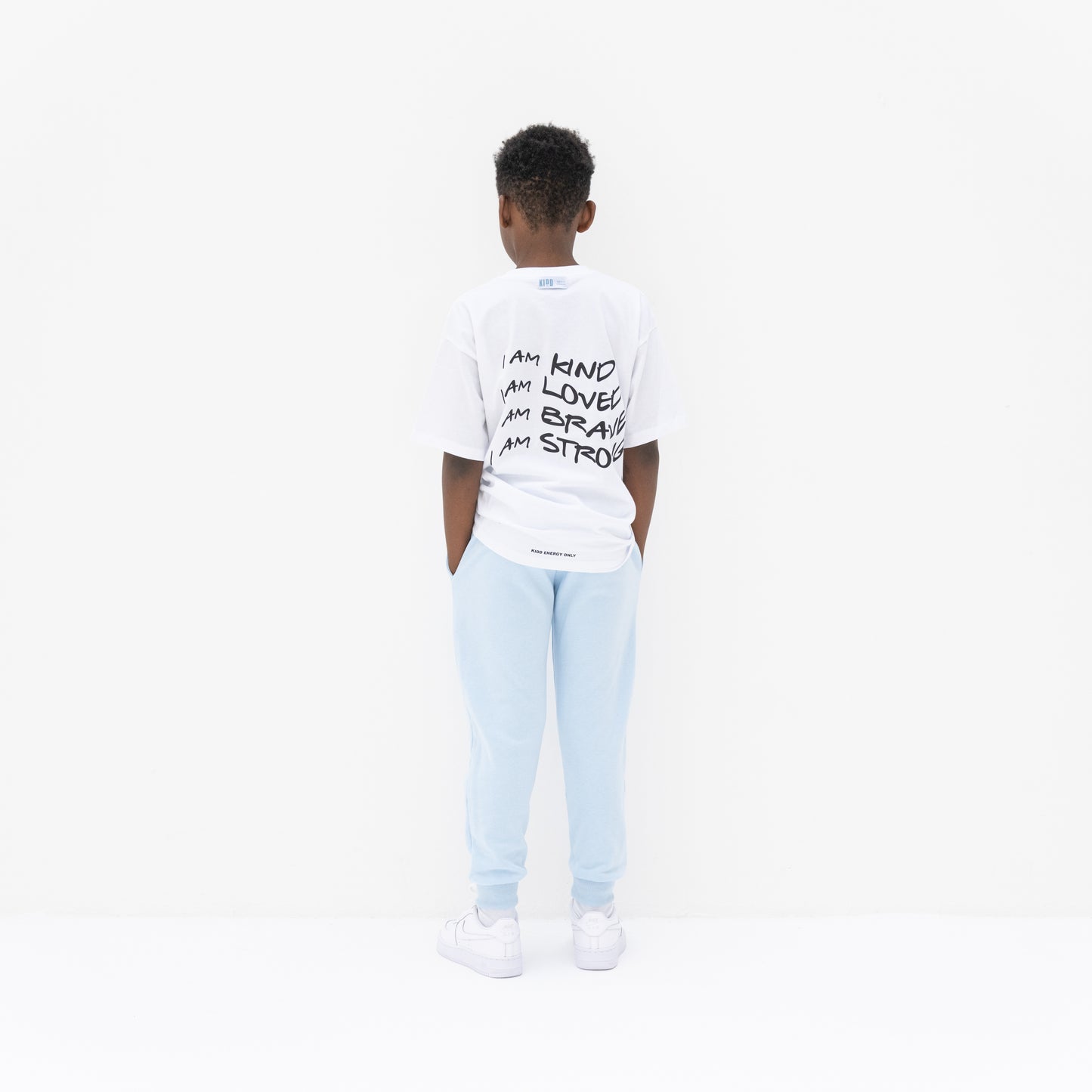 KIDD, @kidd.ae e-shop conceptual children’s brand genderless clothing jogger color sky blue Dubai