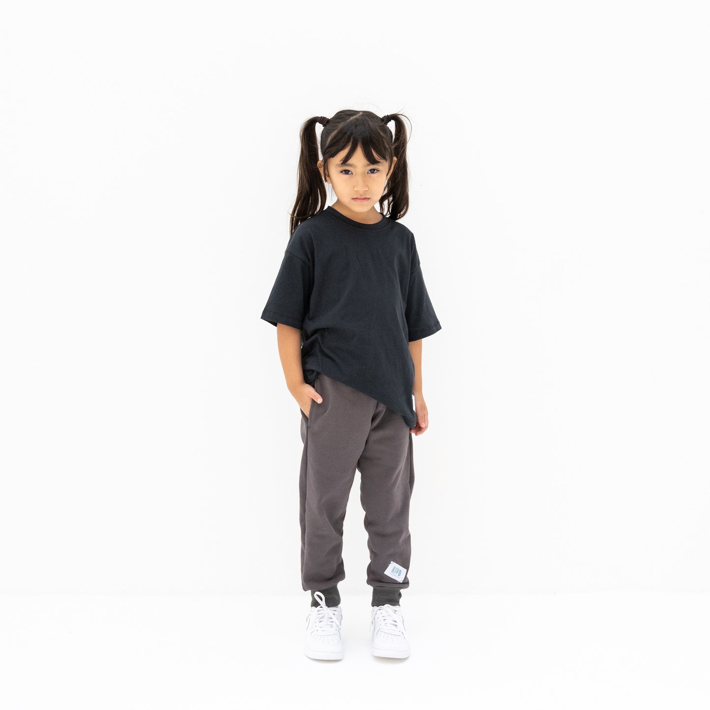 KIDD, @kidd.ae e-shop conceptual children’s brand genderless clothing jogger color medium grey Dubai