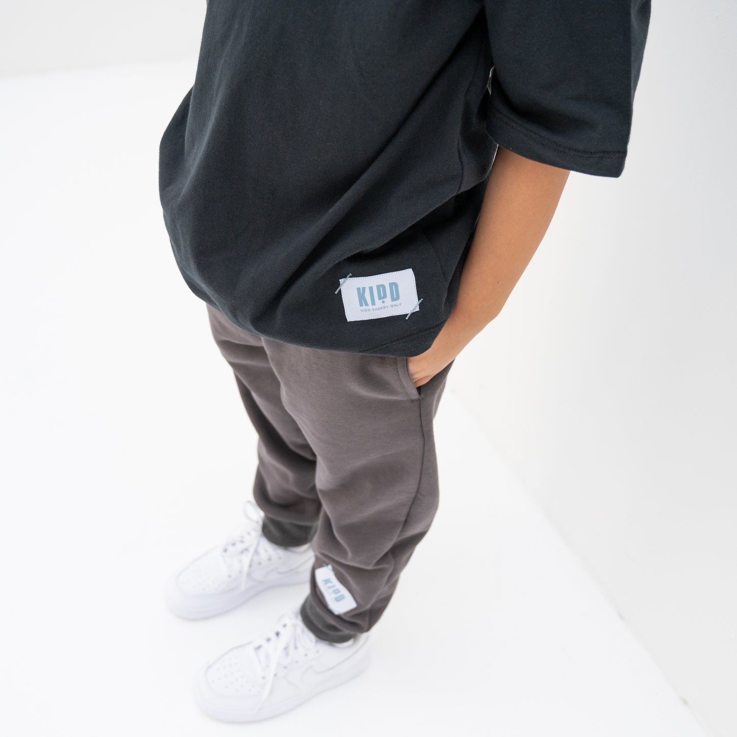 KIDD, @kidd.ae e-shop conceptual children’s brand genderless clothing jogger color medium grey Dubai