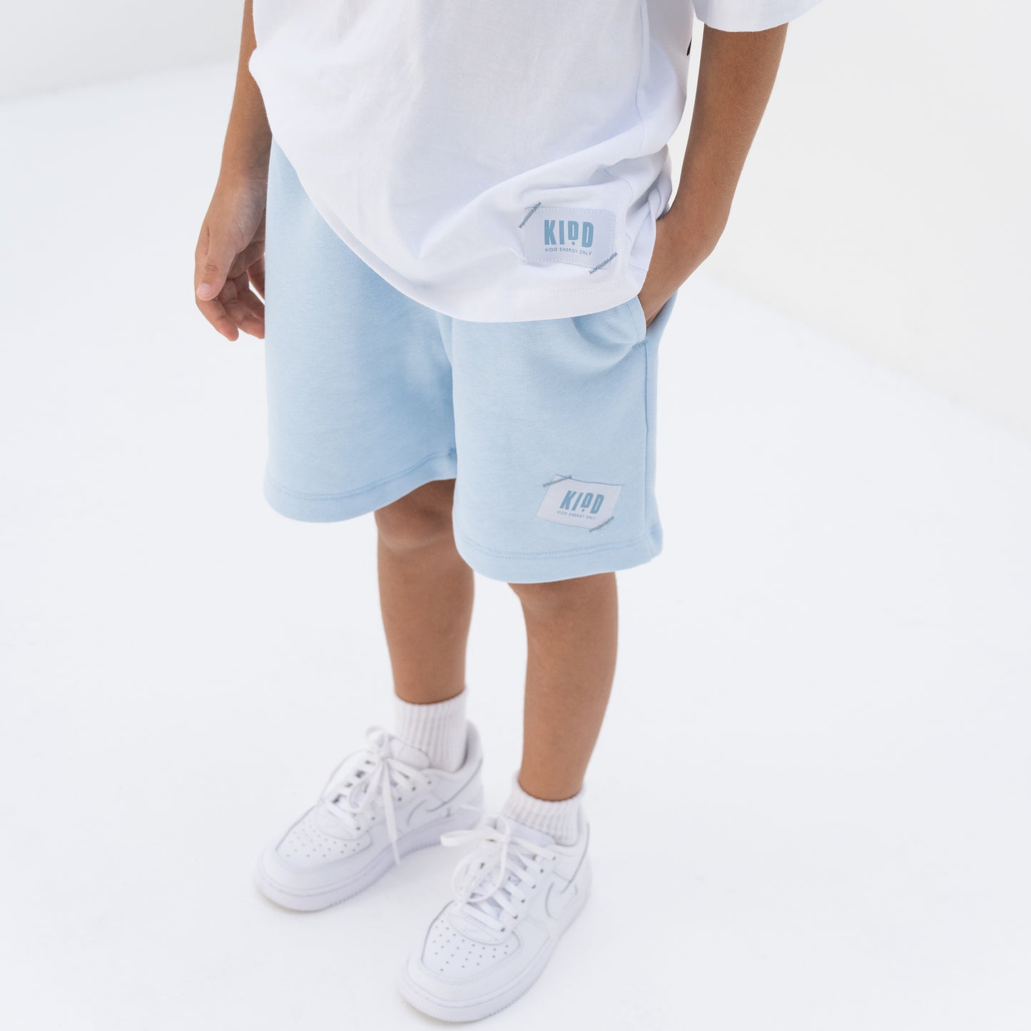 KIDD, @kidd.ae e-shop conceptual children’s brand genderless clothing shorts color sky blue Dubai