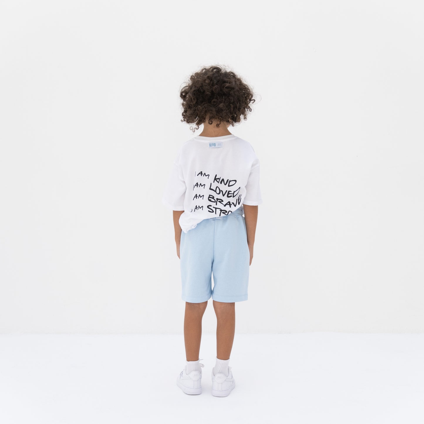 KIDD, @kidd.ae e-shop conceptual children’s brand genderless clothing shorts color sky blue Dubai