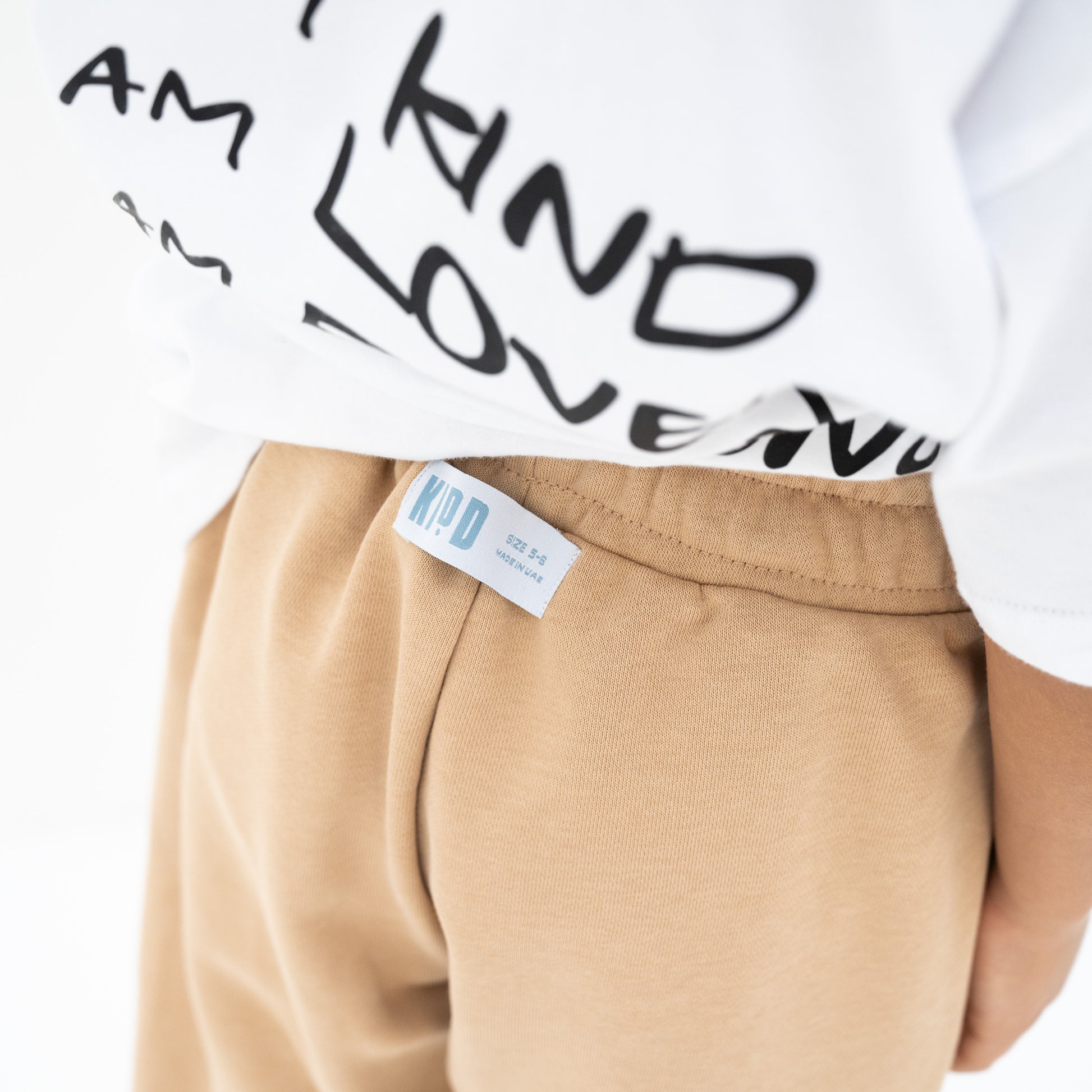 KIDD, @kidd.ae e-shop conceptual children’s brand genderless clothing jogger color sand / beige Dubai