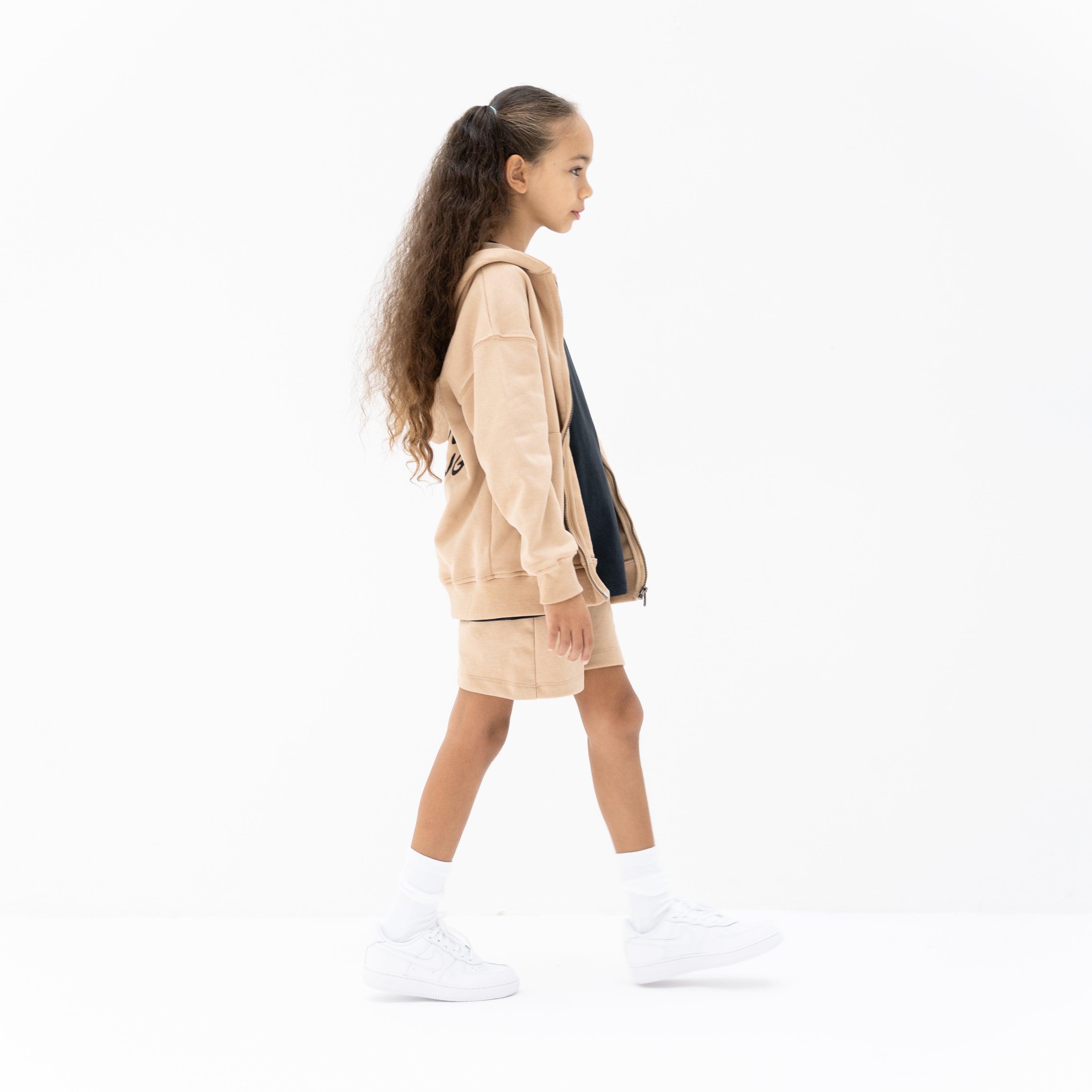 KIDD, @kidd.ae e-shop conceptual children’s brand genderless clothing hoodie shorts outfit set color sand Dubai